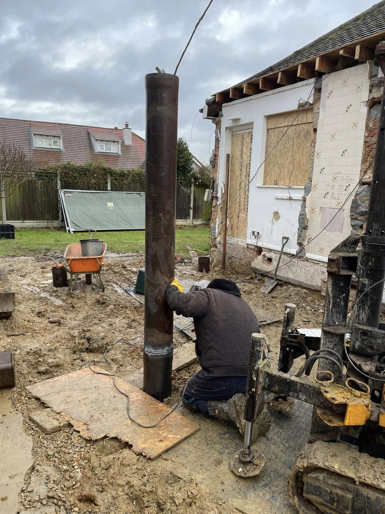 Man operating open bore mini piling machine in Basildon | Essex | Kent | London | Hertfordshire