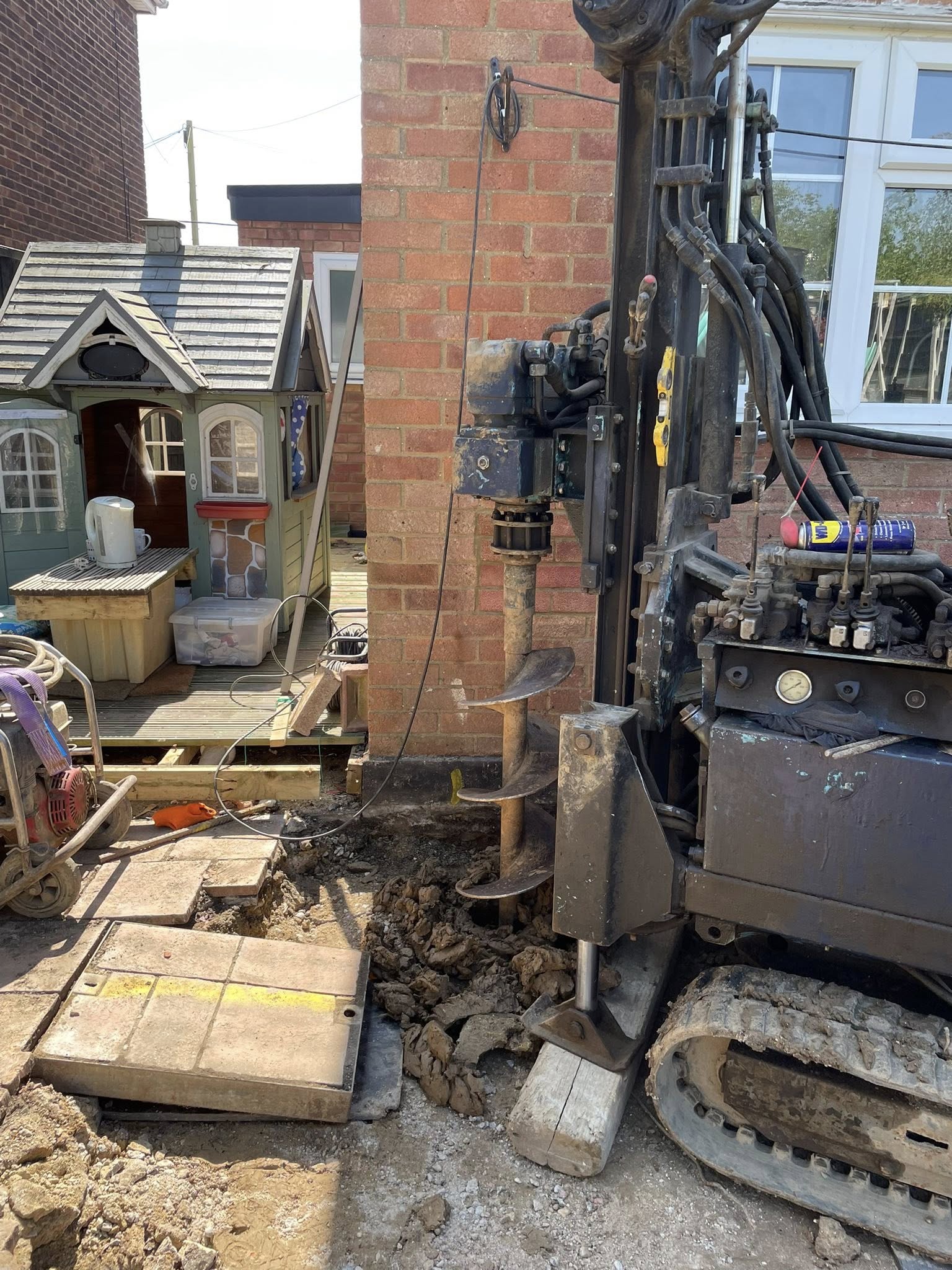 Mini piling machine in back garden in Basildon | Essex | Kent | London | Hertfordshire