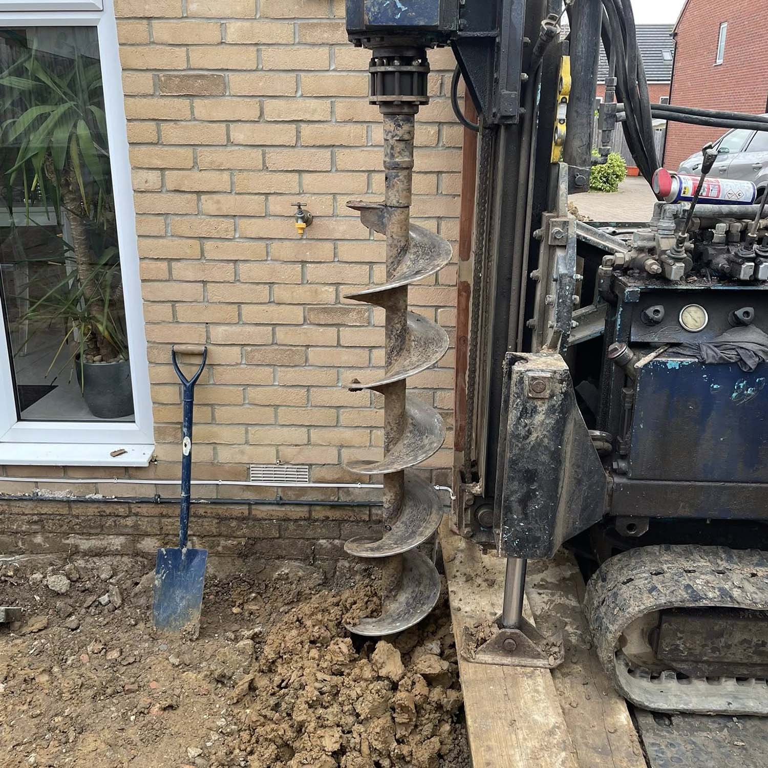 Open bore mini piling in back garden in Basildon | Essex | Kent | London | Hertfordshire