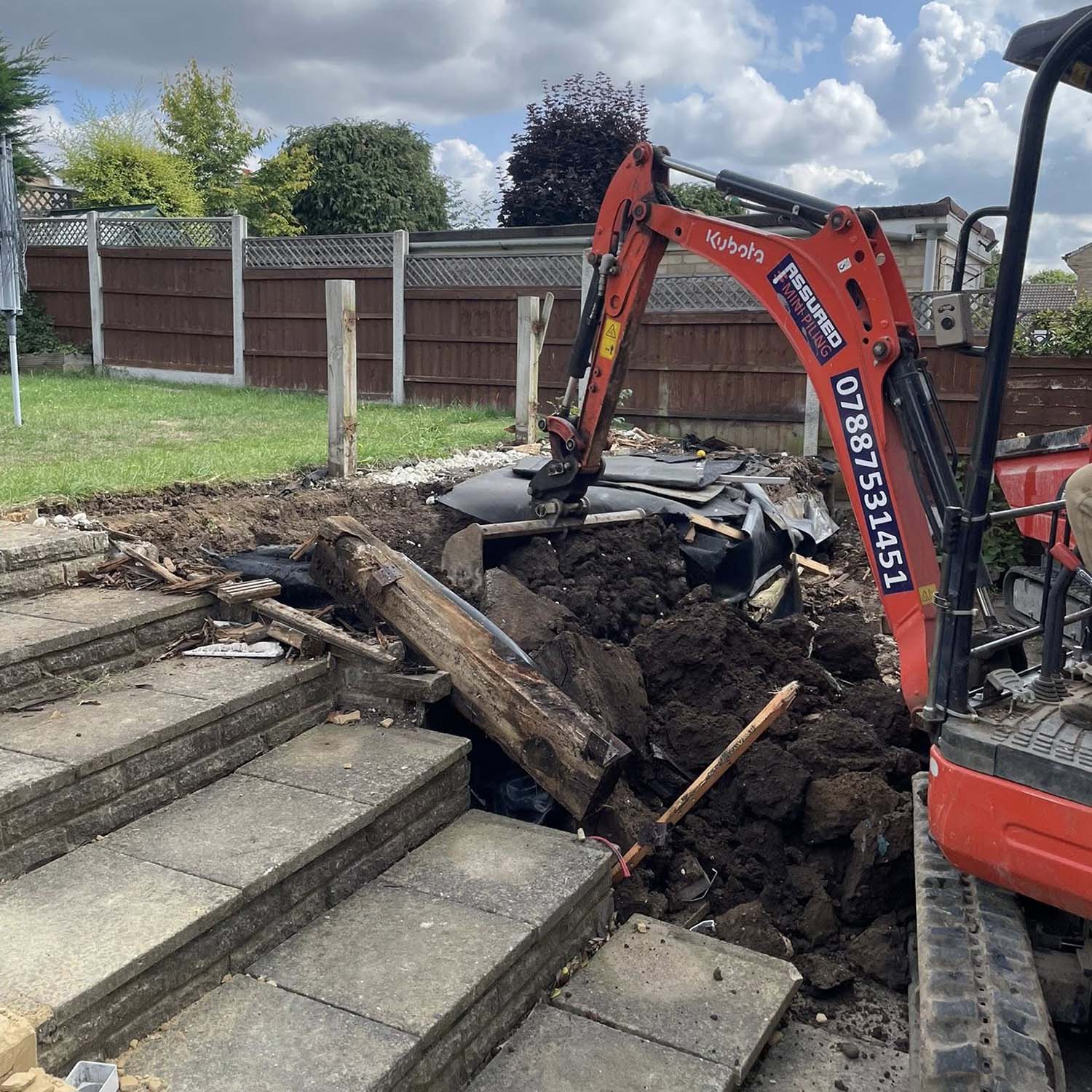 Small excavator digging up back garden in Basildon | Essex | Kent | London | Hertfordshire